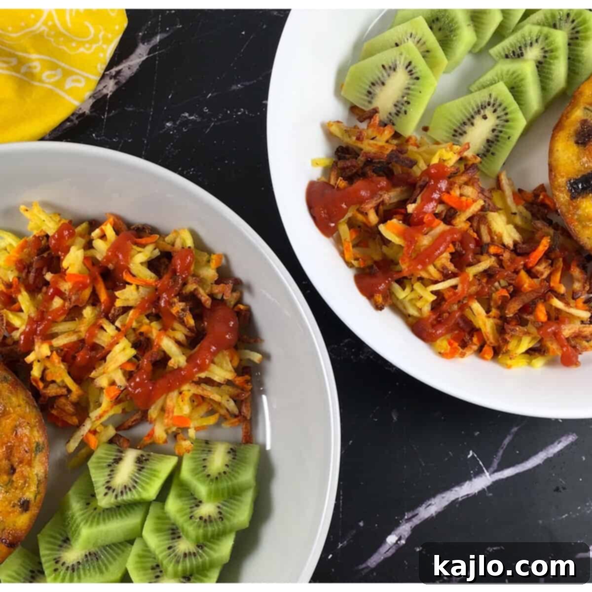 A complete breakfast meal featuring air fryer breakfast potatoes, alongside eggs and other items.