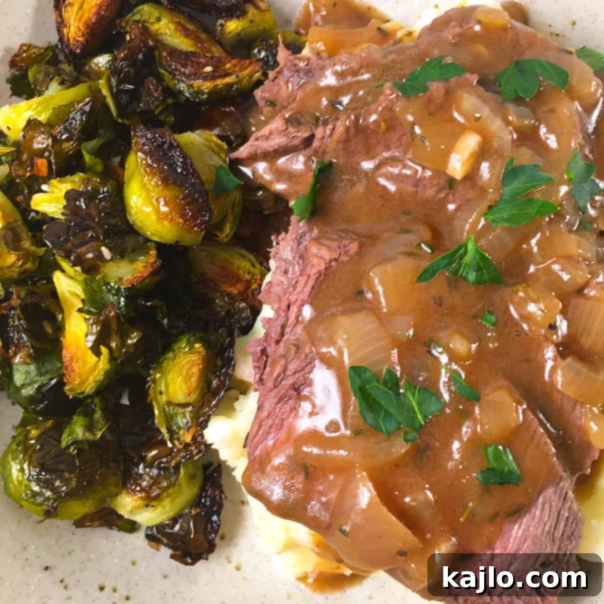 Tender and juicy Instant Pot London Broil steak served with rich gravy