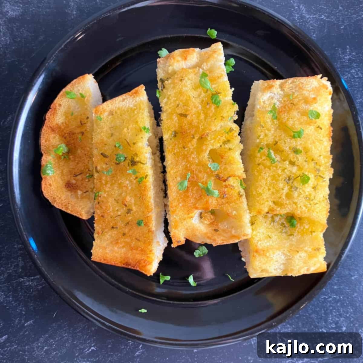 Air Fryer Foil Pack Garlic Bread 6 Garlic bread in air fryer without foil, perfectly golden brown.
