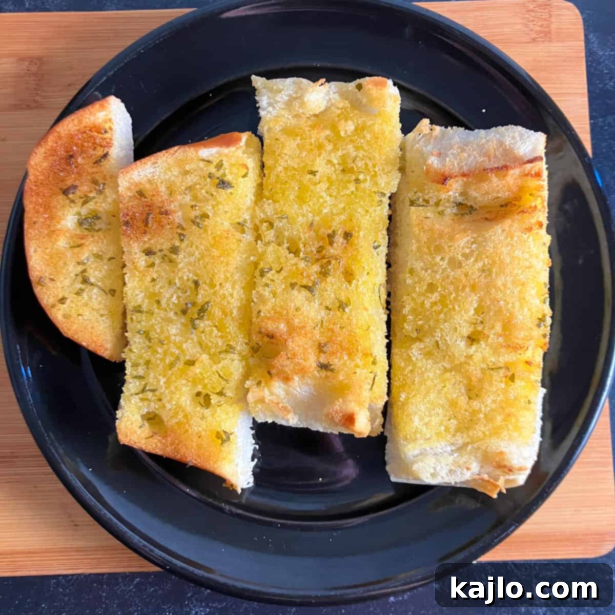 Air Fryer Foil Pack Garlic Bread 7 Reheating garlic bread in air fryer, ensuring crispness.