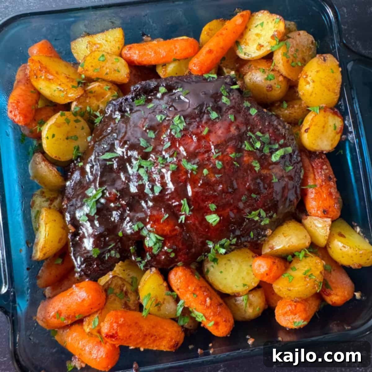 pork shoulder recipe served with sides