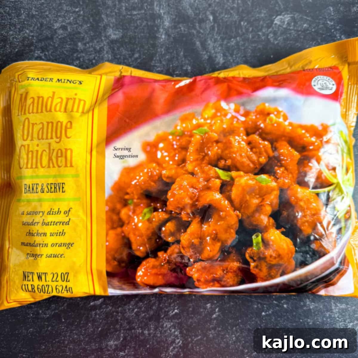 Trader Ming's Mandarin Orange Chicken Bag A bag of Trader Joe's Orange Chicken with sauce packets.