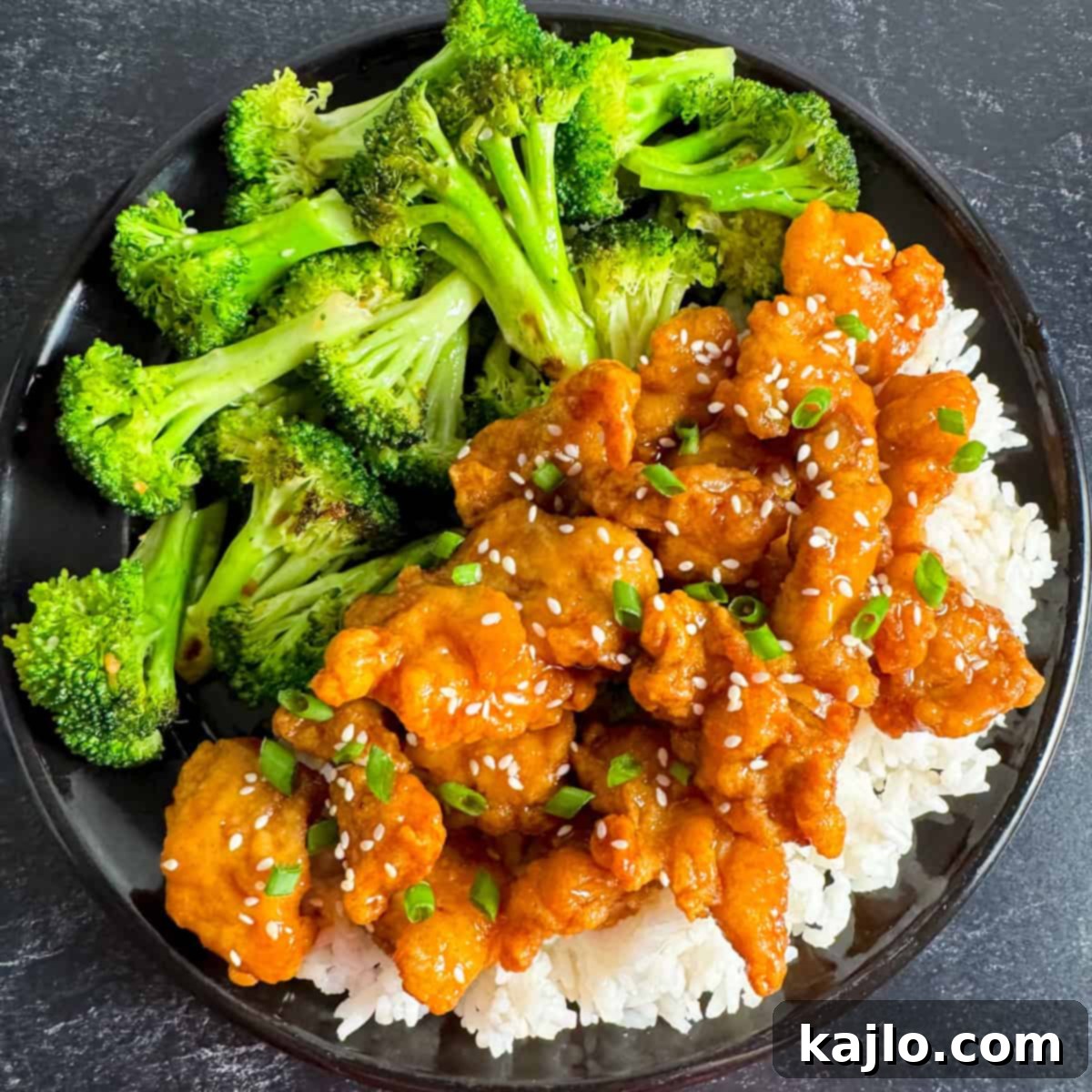 Trader Joe's Orange Chicken Meal A serving of Trader Joe's orange chicken with rice and broccoli.