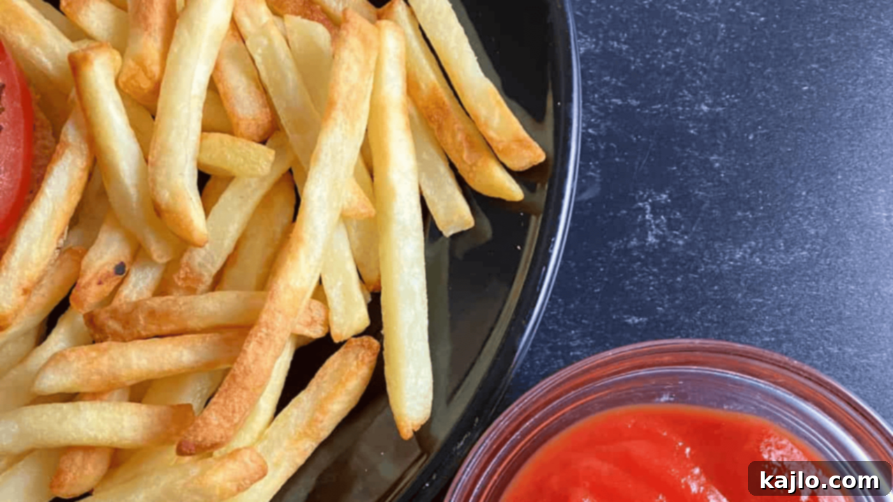 Air fryer frozen French fries, perfectly crispy and delicious every time.