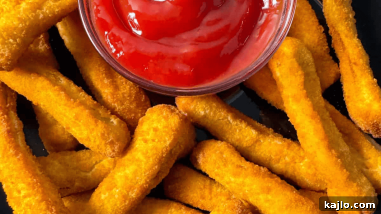 Air fryer chicken fries, quick and easy for snacks or dinner, served with dipping sauce.