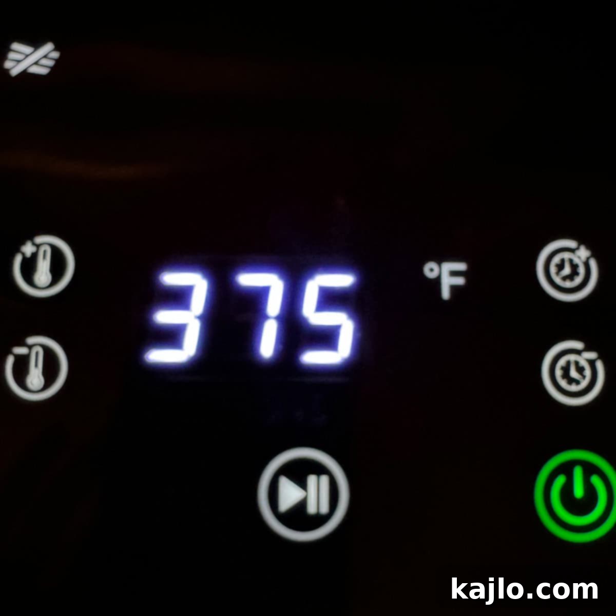 Easy Air Fryer Chili Bean Soup 5 Soup cooking inside an air fryer, with foil-covered ramekins ensuring even and moist heating.