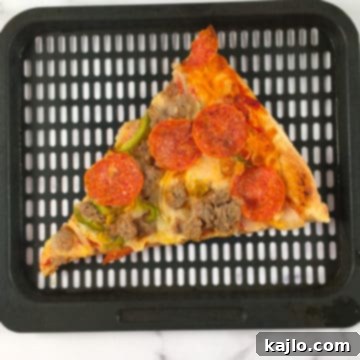 Close-up of a pepperoni pizza slice