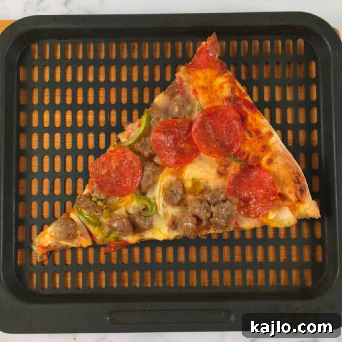Air fryer reheating pizza slice
