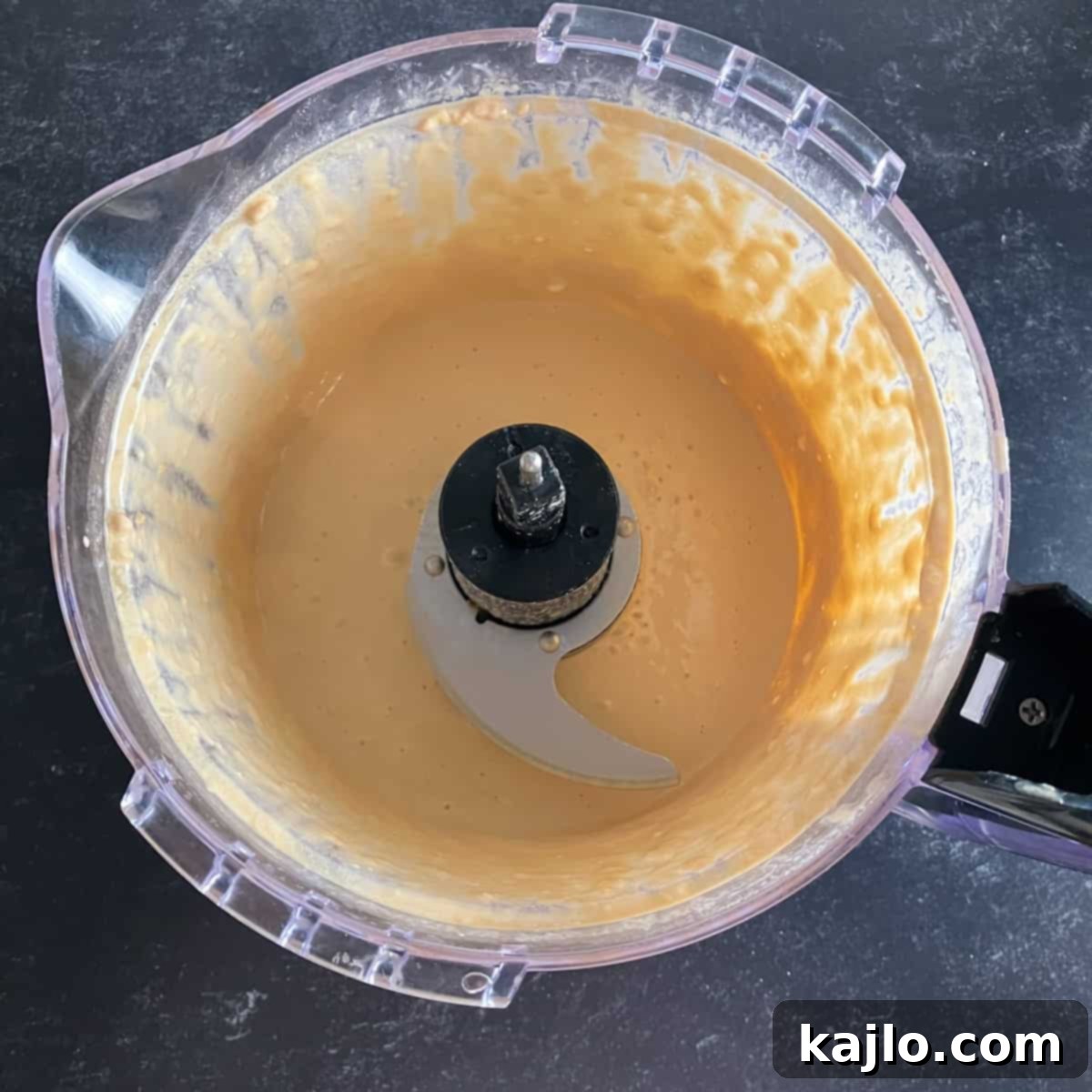 Light Plant-Powered Bowls for Vibrant Health 5 Creamy tahini nourish bowl dressing in a small bowl