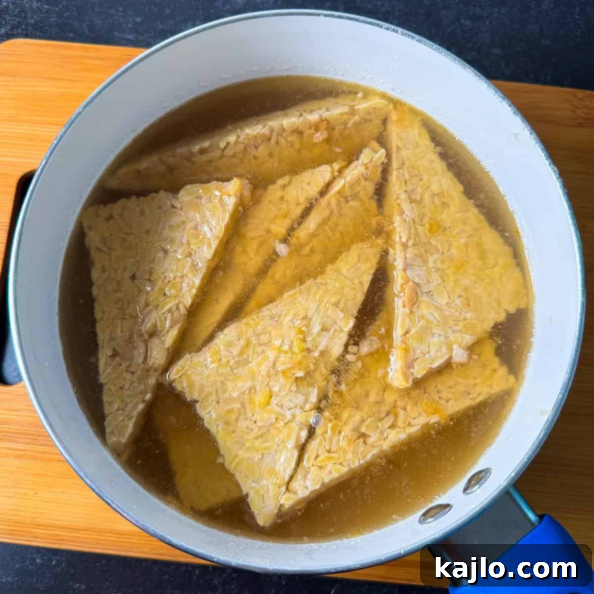Simmering tempeh in vegetable broth