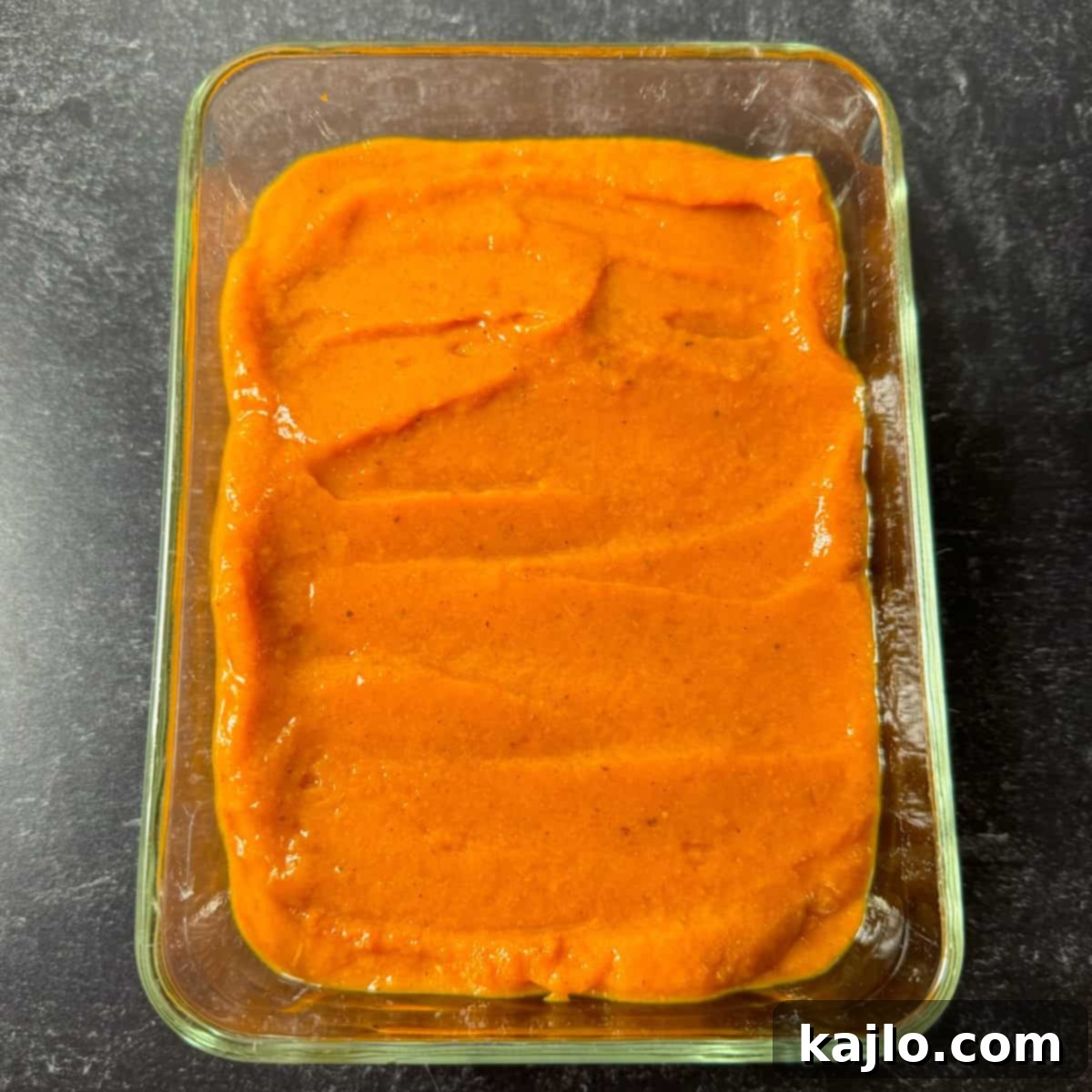 Pumpkin Spice Nice Cream 5 Scoops of pumpkin nice cream in a bowl