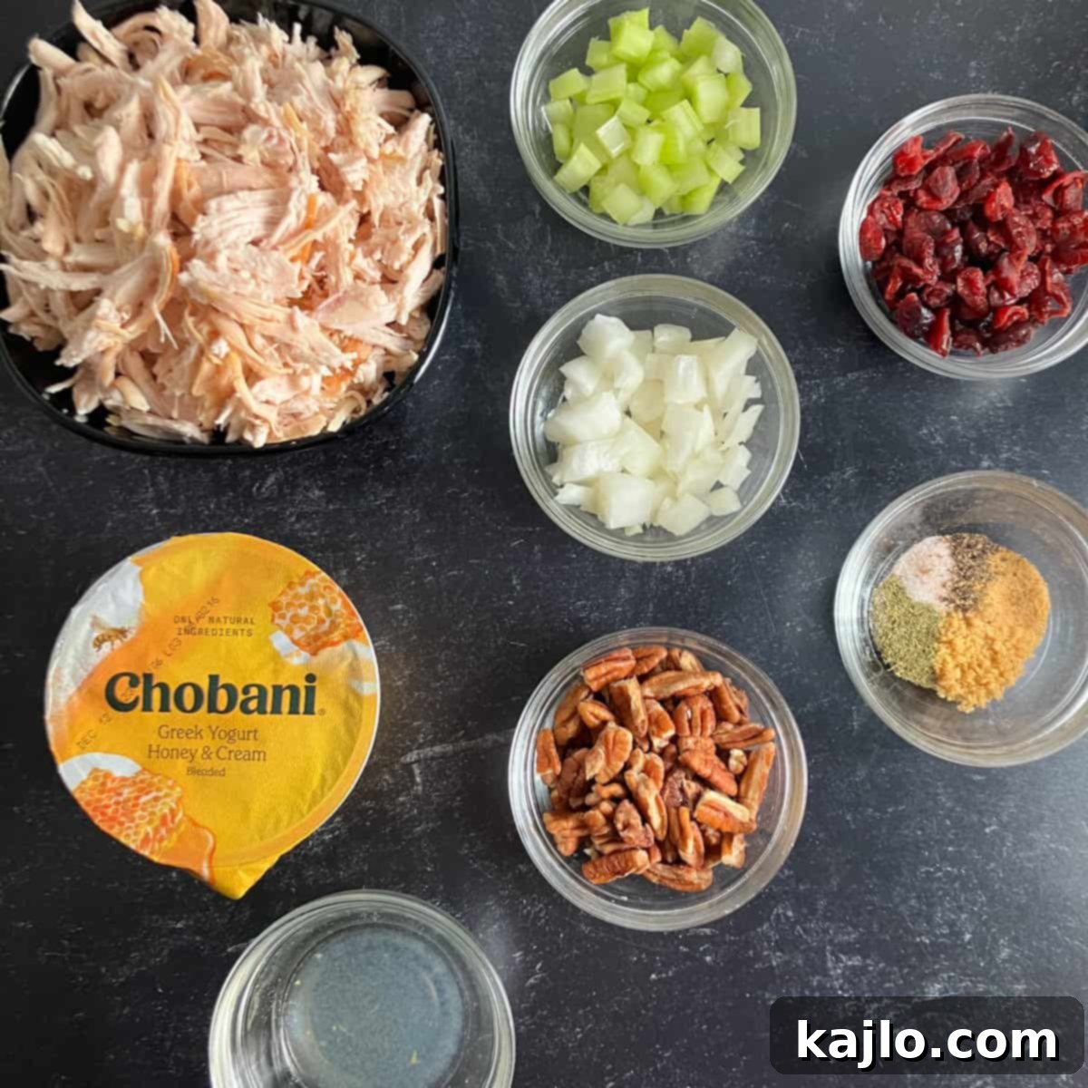 all ingredients for turkey salad without mayo laid out on a table