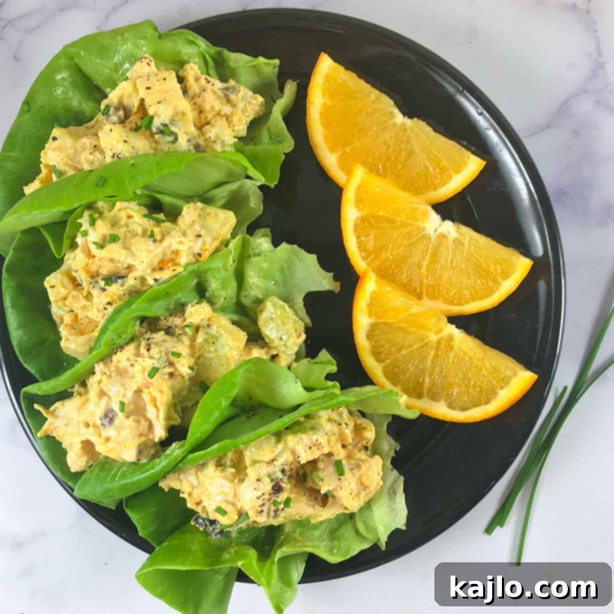 lettuce cups with turkey salad made with high protein curry yogurt sauce