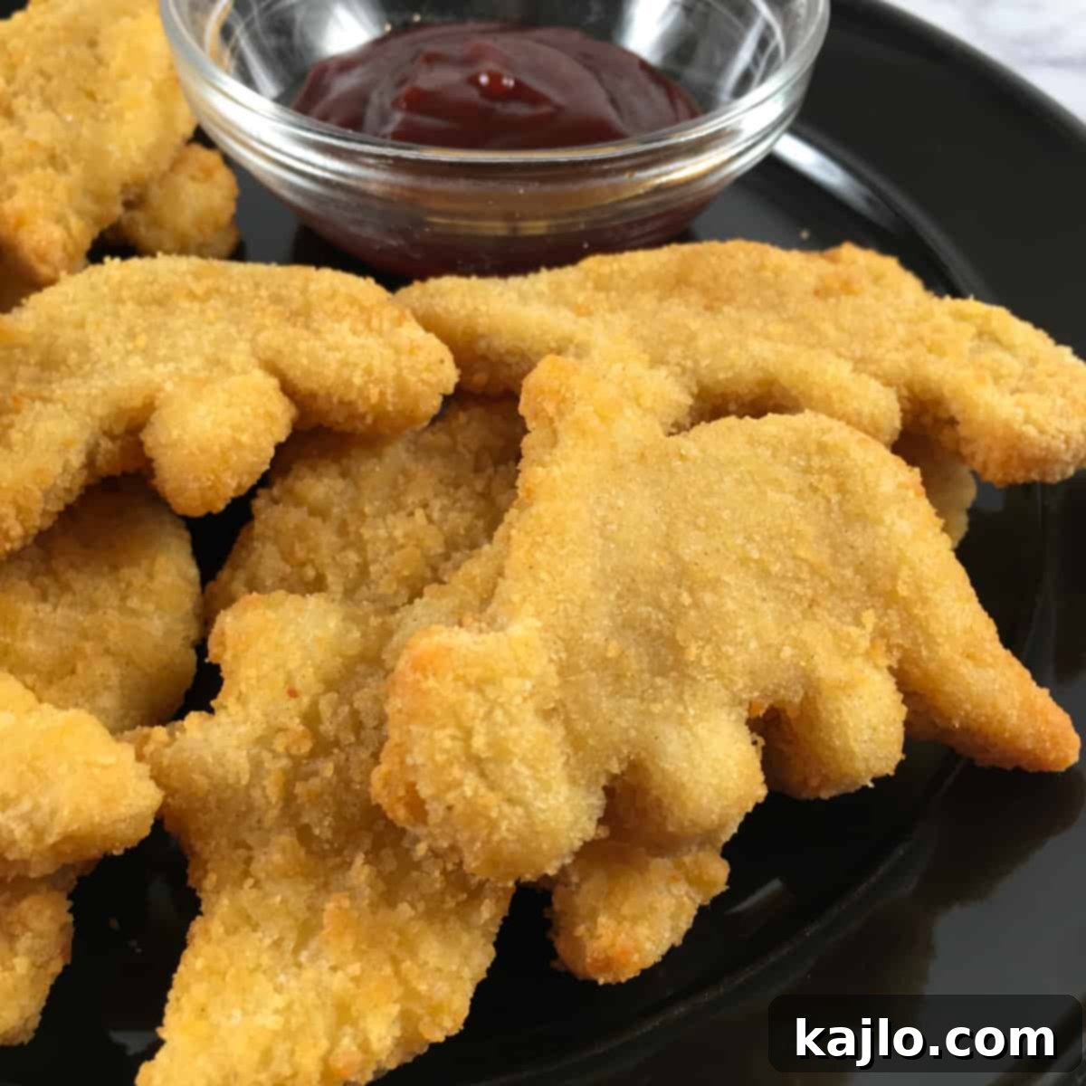 Crispy Dino Buddies Dinosaur Chicken Nuggets Air Fryer Recipe 6 Dino chicken nuggets in the air fryer basket