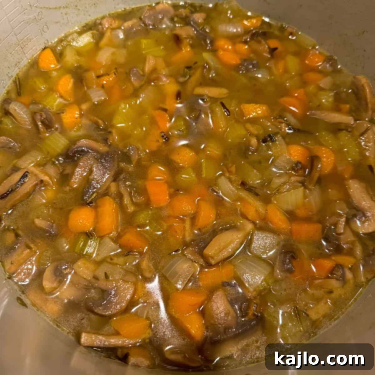 Instant Pot and Slow Cooker Turkey Wild Rice Soup 5 Ingredients in a slow cooker for turkey wild rice soup, ready for cooking.