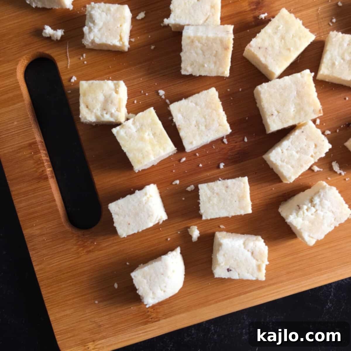 Easy Instant Pot Paneer 2 Freshly made paneer in an Instant Pot, ready for cubing.