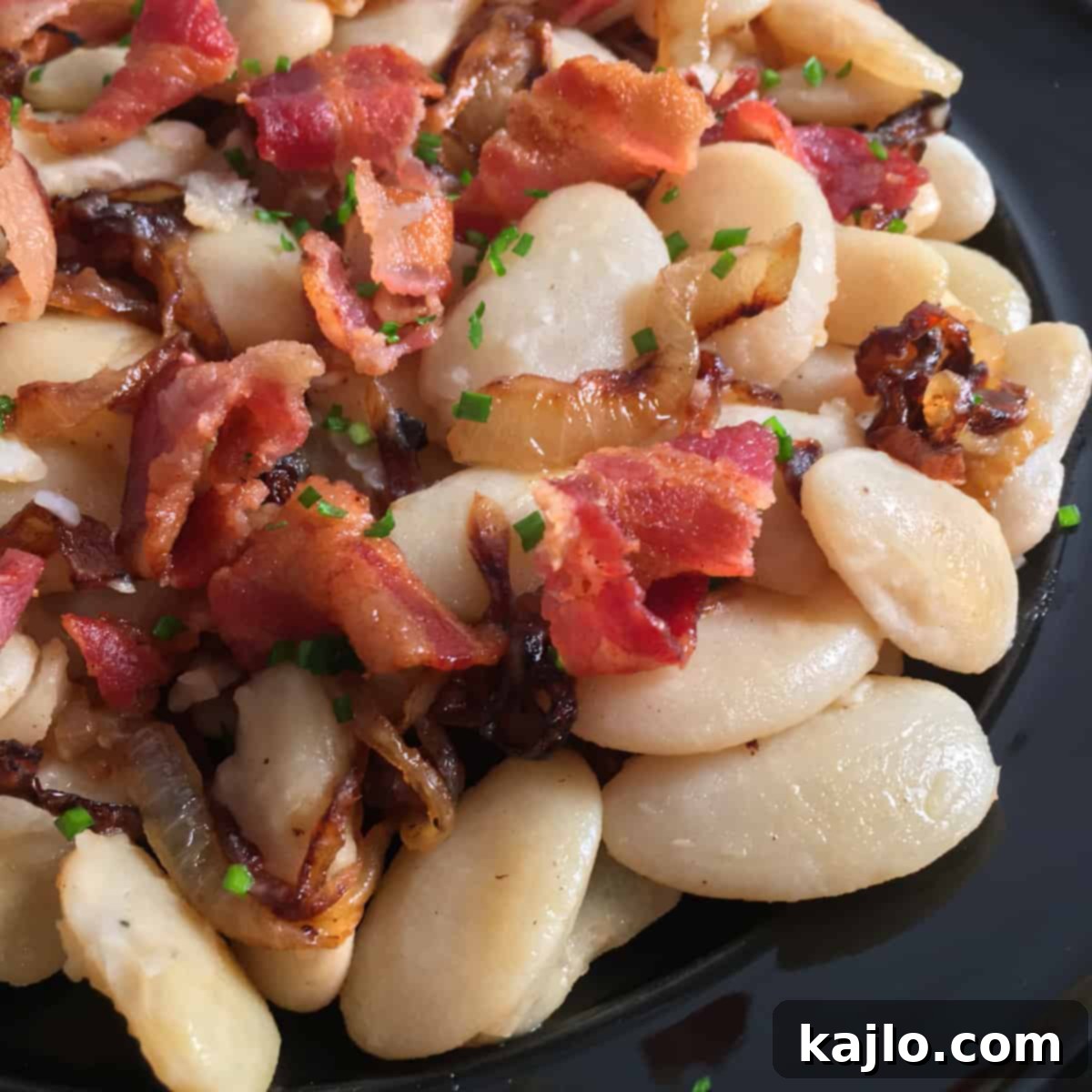 Easy Instant Pot Lima Beans 8 Lima beans garnished with crispy bacon