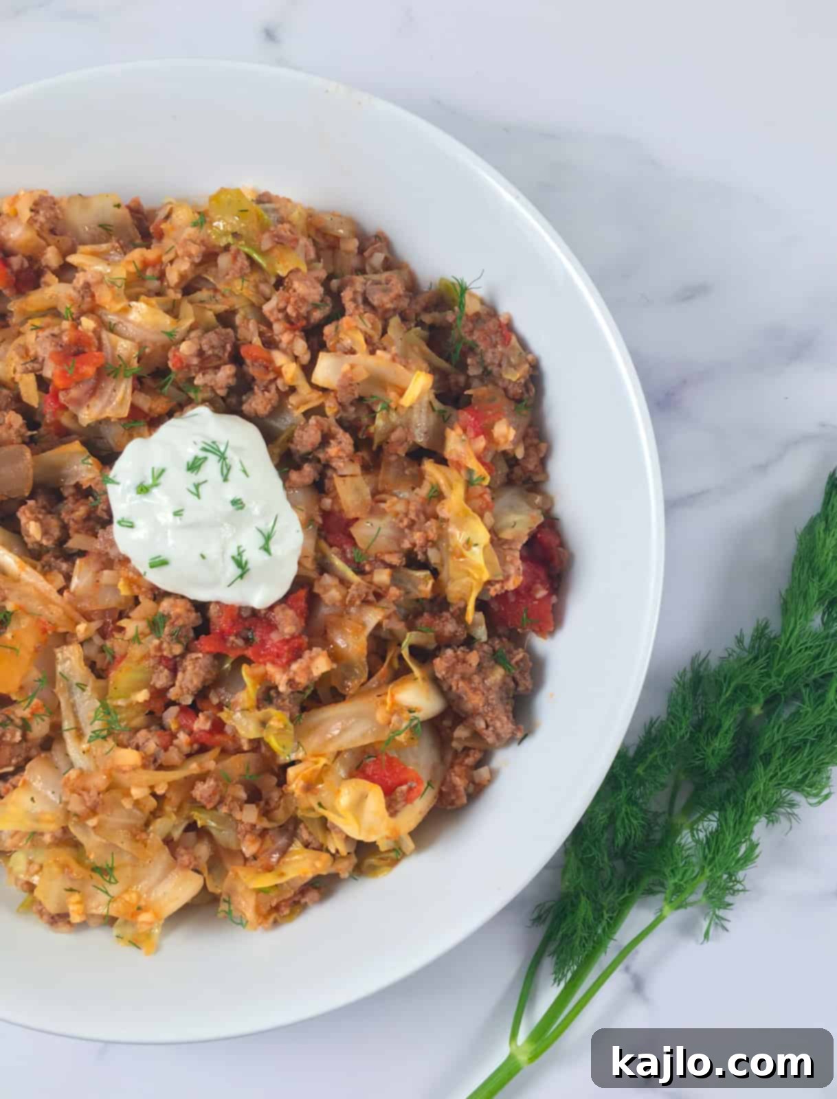 Easy Keto Unstuffed Cabbage Skillet 5 Keto unstuffed cabbage rolls recipe with fresh dill garnish