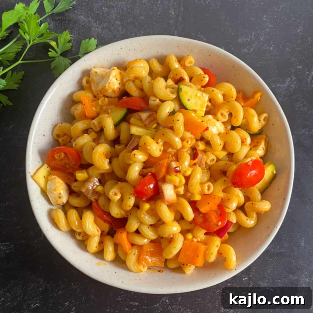 McCormick Salad Supreme Pasta Salad 7 A close-up of a serving of Salad Supreme Pasta Salad, highlighting its inviting texture and colors.