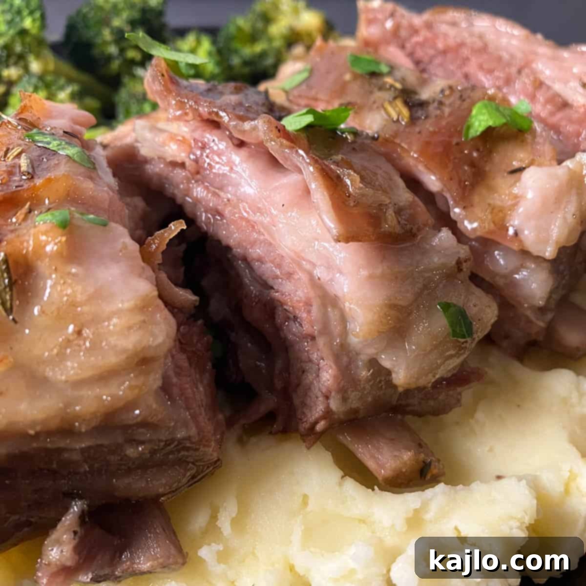 Cooked lamb breast strips served on a plate