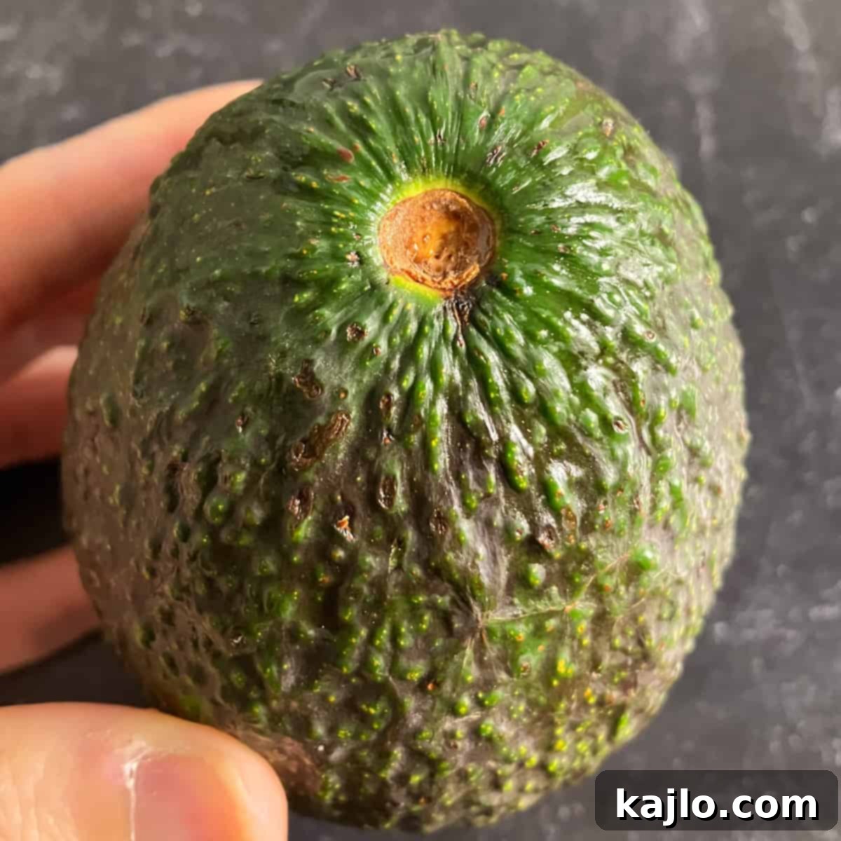 Spotty Avocado: Is It Still Good to Eat 5 A perfectly ripe avocado half showing no brown spots, indicating optimal freshness and quality.