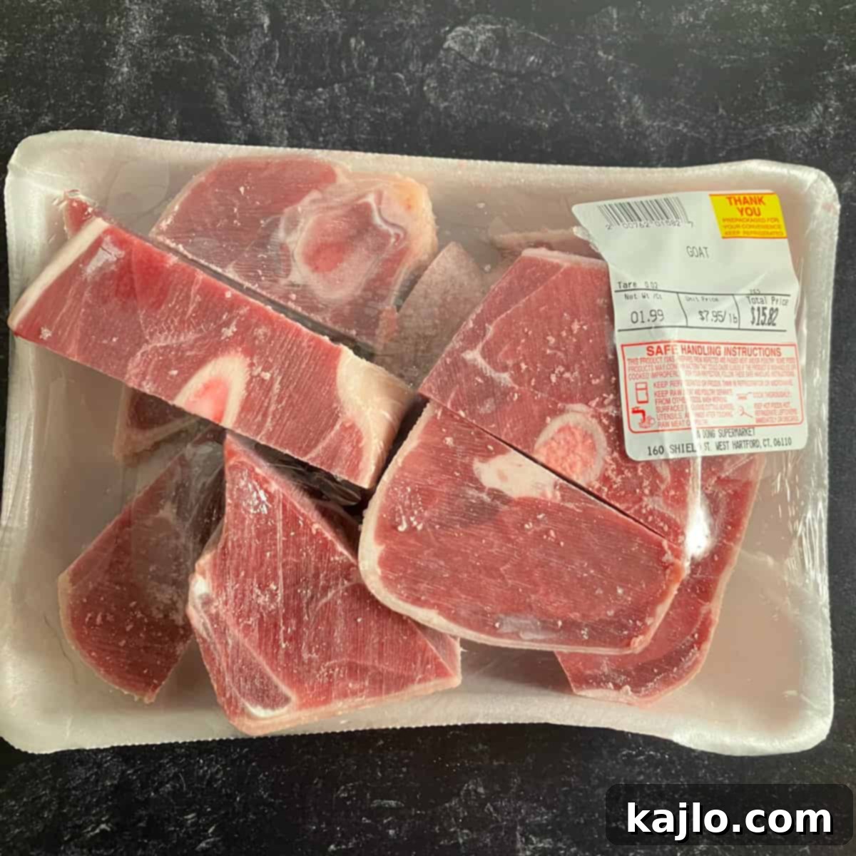 Goat Meat Your Complete Guide to Recipes Sourcing and Health Benefits 3 Fresh cuts of raw goat meat, bone-in, ready for preparation.