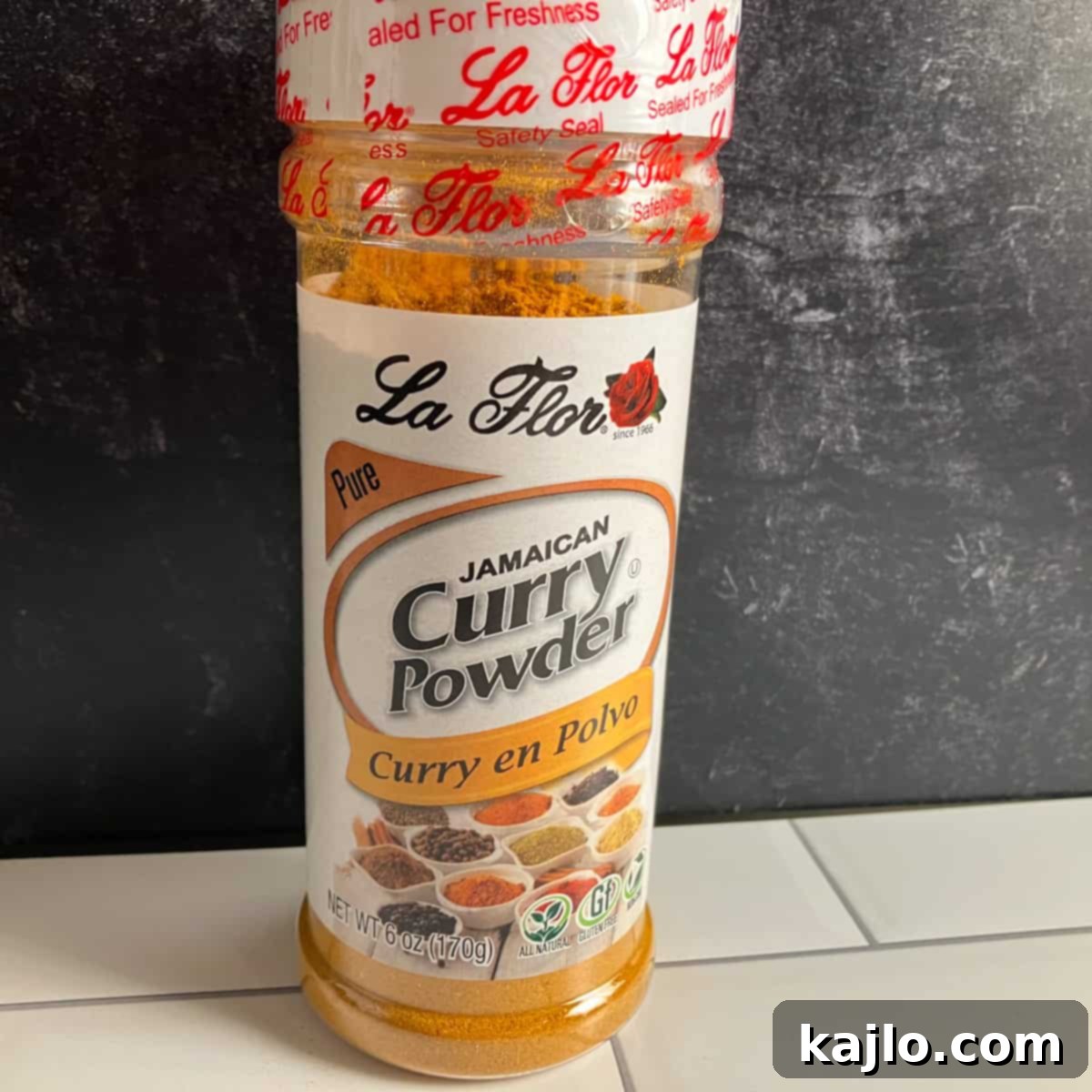 Goat Meat Your Complete Guide to Recipes Sourcing and Health Benefits 7 A container of authentic Jamaican curry powder, a key seasoning for goat meat.