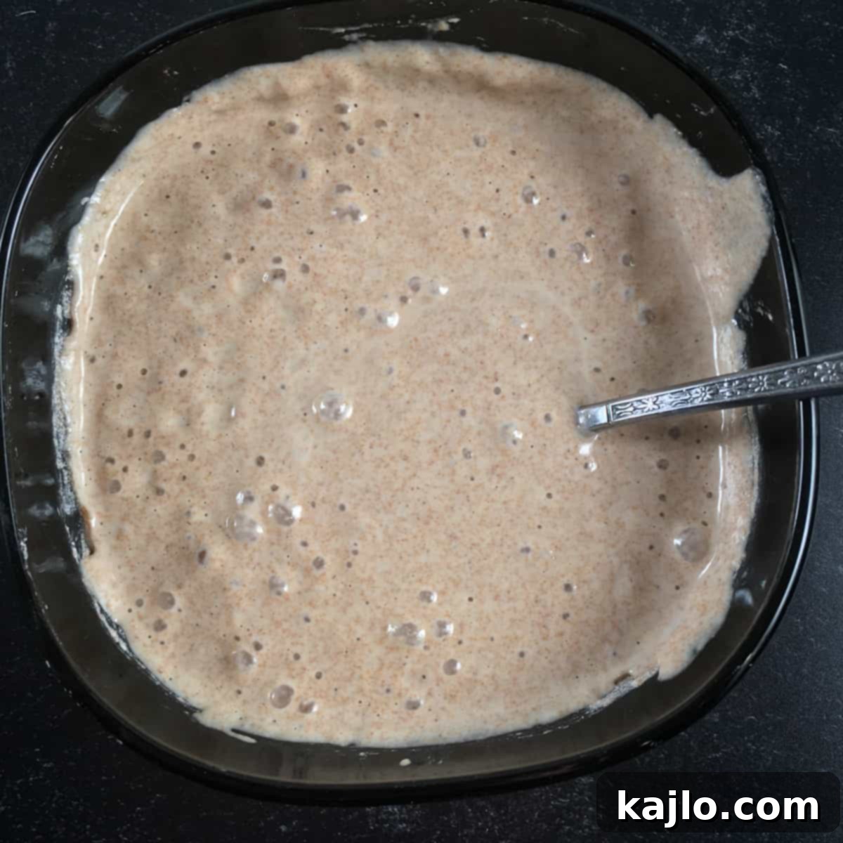 Cultivating Your Own Spelt Sourdough Starter 2 Active spelt flour sourdough starter bubbling vigorously in a glass jar