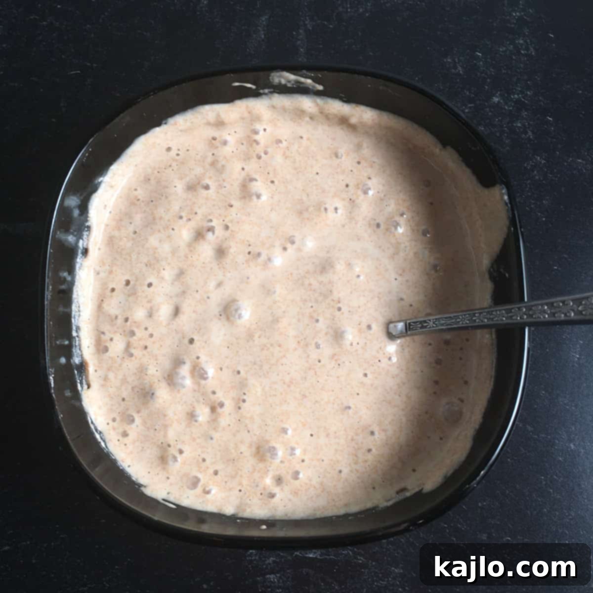 Cultivating Your Own Spelt Sourdough Starter 7 Jar of active spelt flour sourdough starter with a measurement label