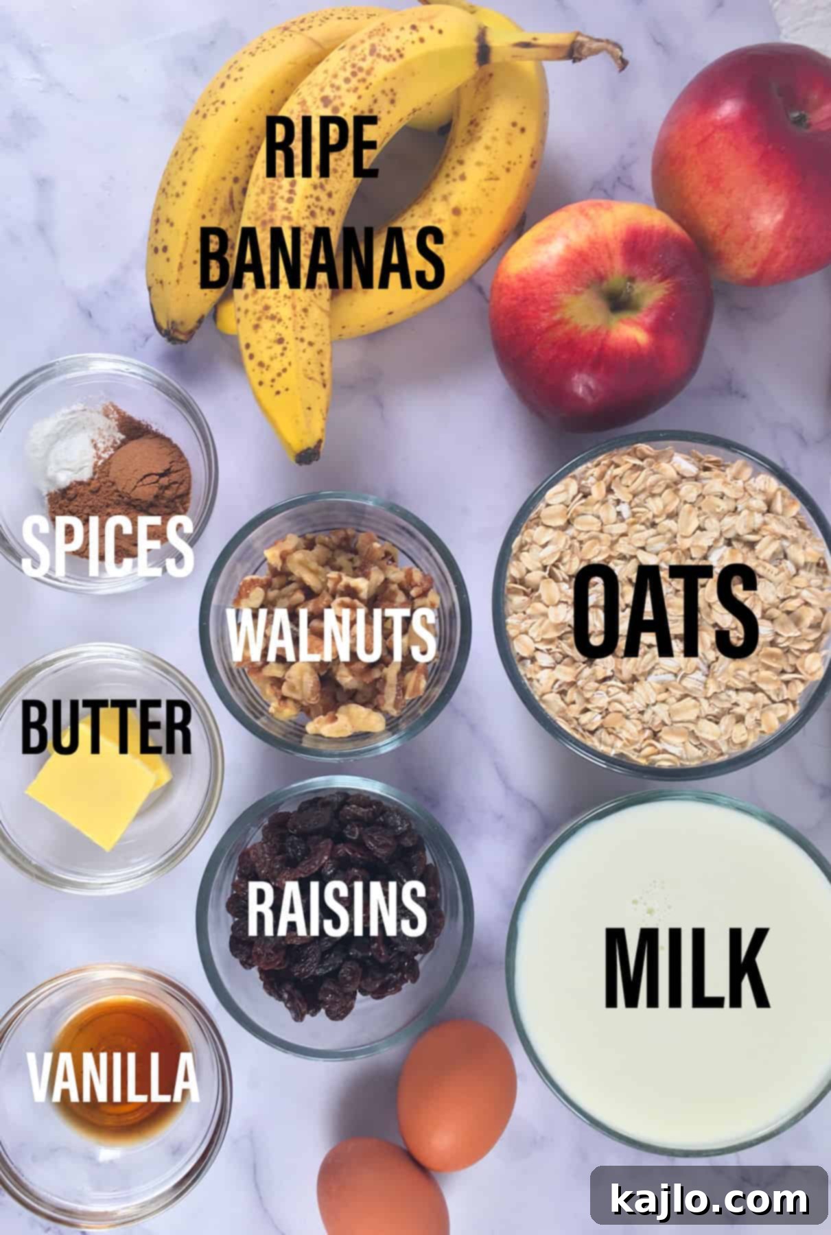 Guilt-Free Baked Oatmeal Bliss 4 Ingredients for no sugar baked oatmeal: rolled oats, bananas, walnuts, raisins, spices, eggs, milk, vanilla, butter, apples.