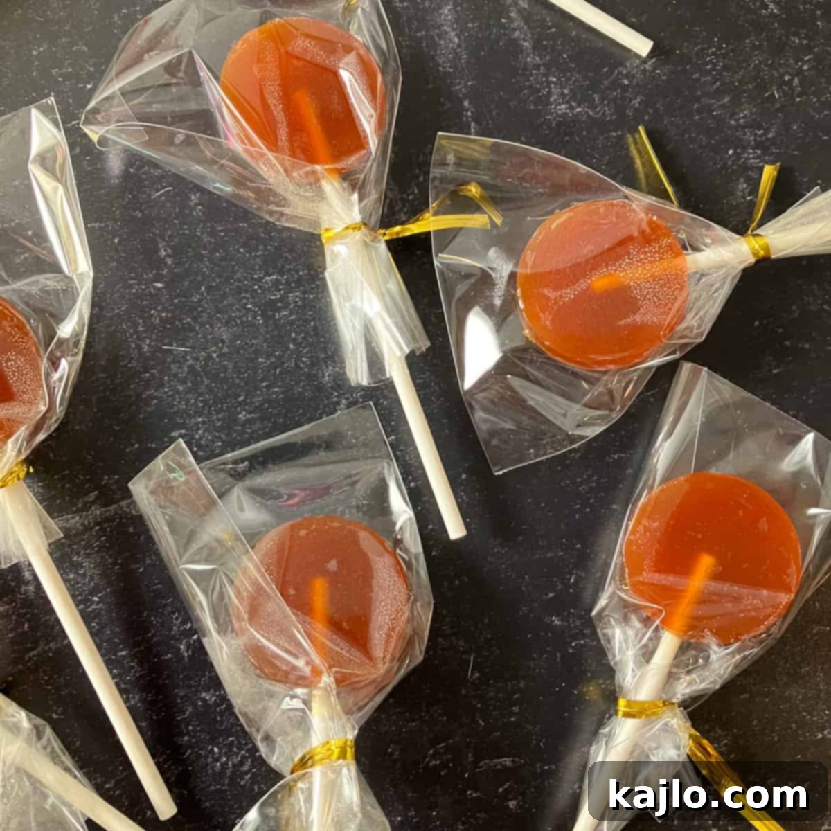Soothing Honey Lollipops for Coughs and Tea 8 Finished honey lollipops in a silicone mold, ready for packaging.