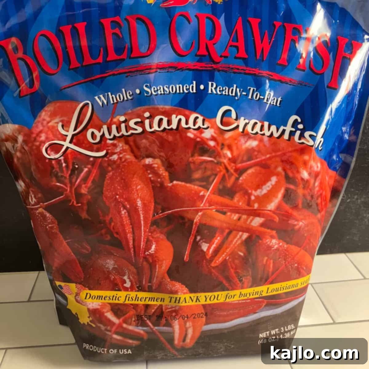 A bag of seasoned frozen crawfish from a grocery store