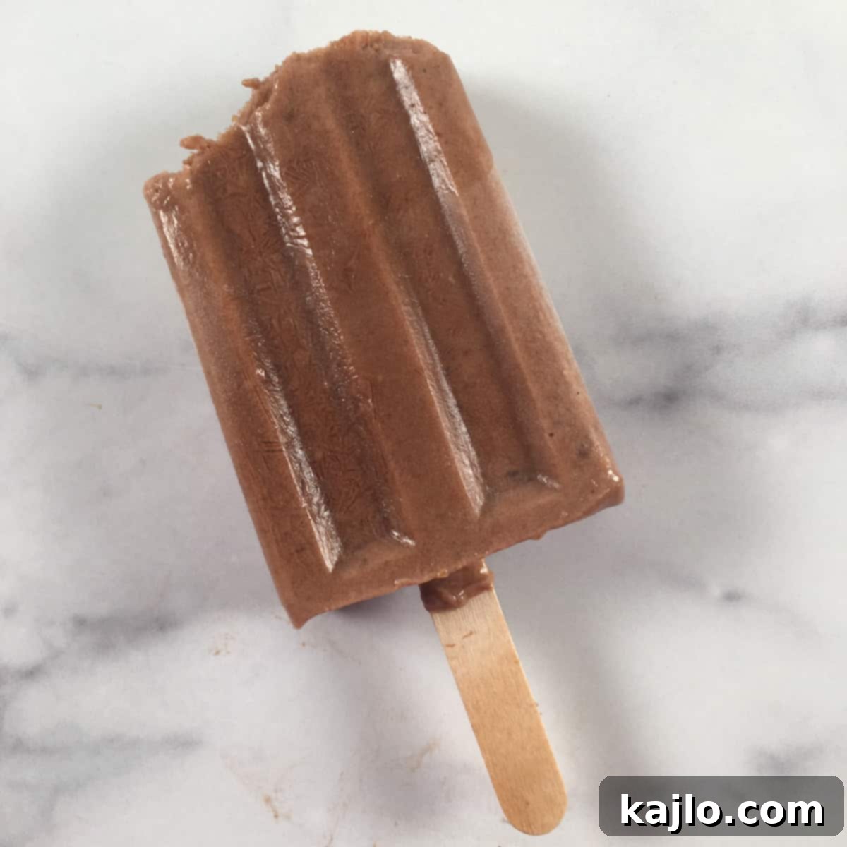 Sugar-Free Vegan Banana Popsicles 6 A close-up of a delicious banana pop with no sugar added, ready to eat.