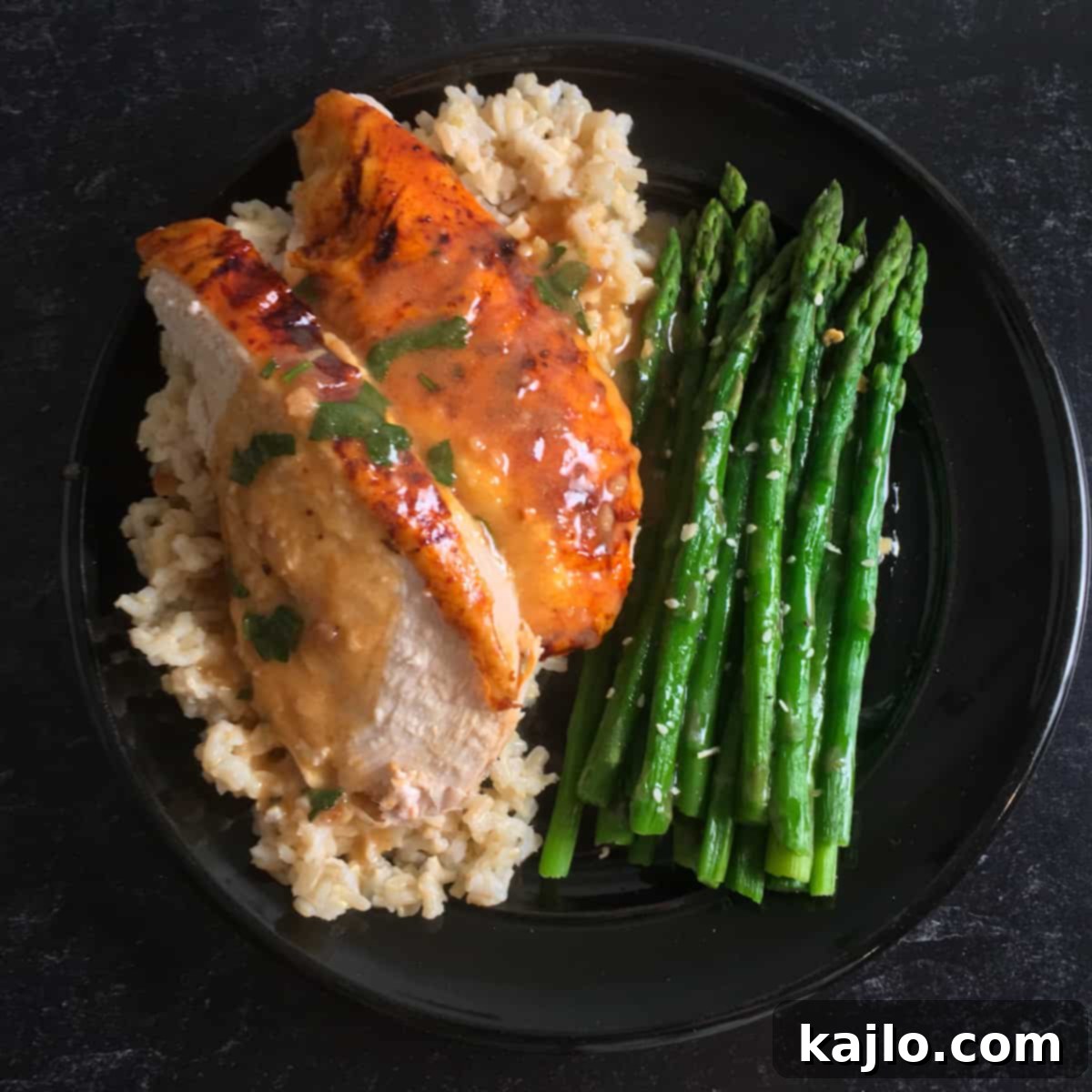 A complete meal with roasted whole chicken and delicious sides.