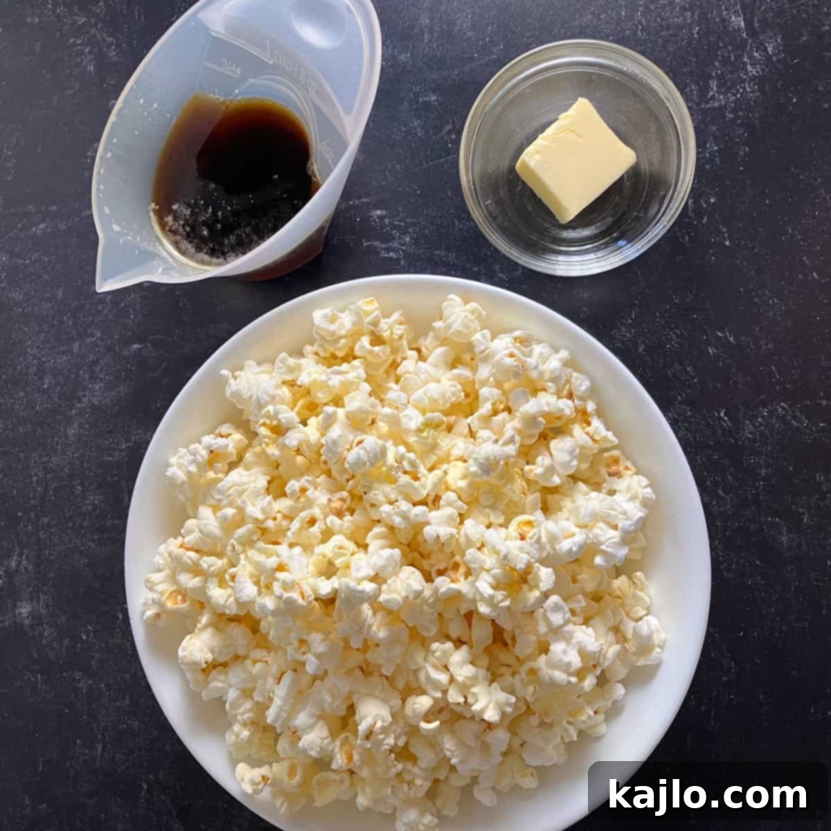 Maple Glazed Popcorn 3 Ingredients for maple popcorn laid out