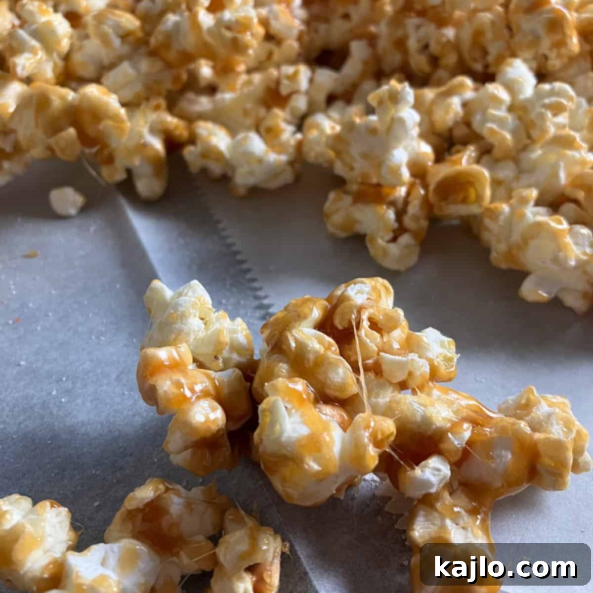 Maple Glazed Popcorn 4 Maple popcorn recipe spread on parchment paper