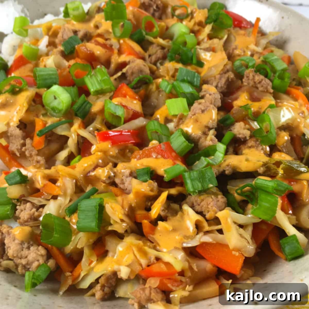 Inside Out Egg Roll Recipe Video 6 An inviting egg roll in a bowl, showcasing its rich texture and colors