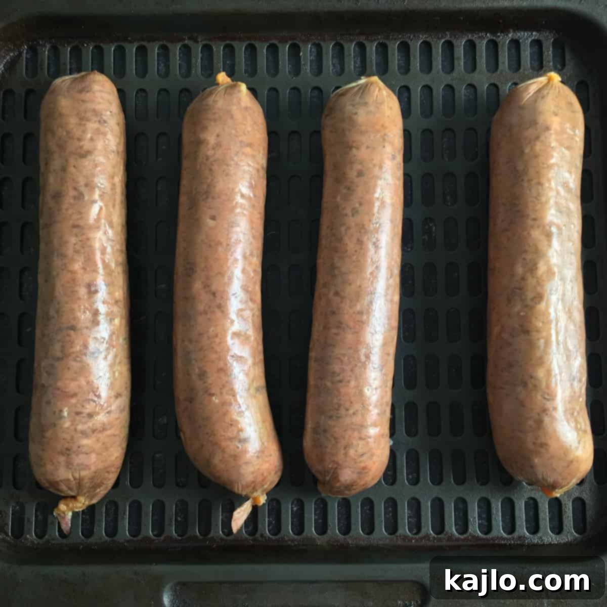 Kielbasa placed in air fryer basket