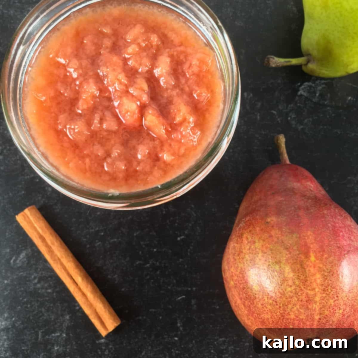 A bowl of healthy pear sauce as an applesauce substitute