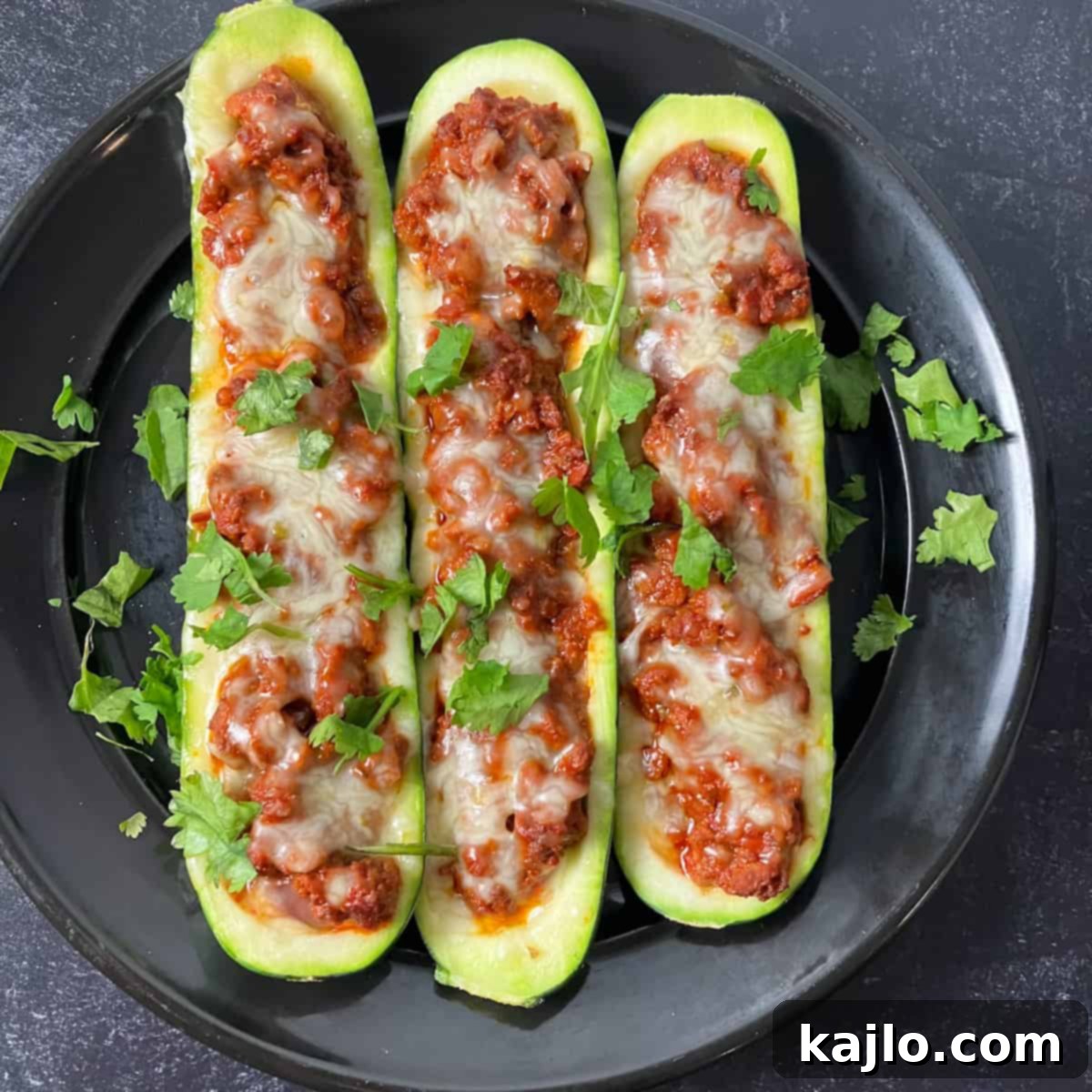 Delicious chorizo stuffed zucchini boats ready to be served