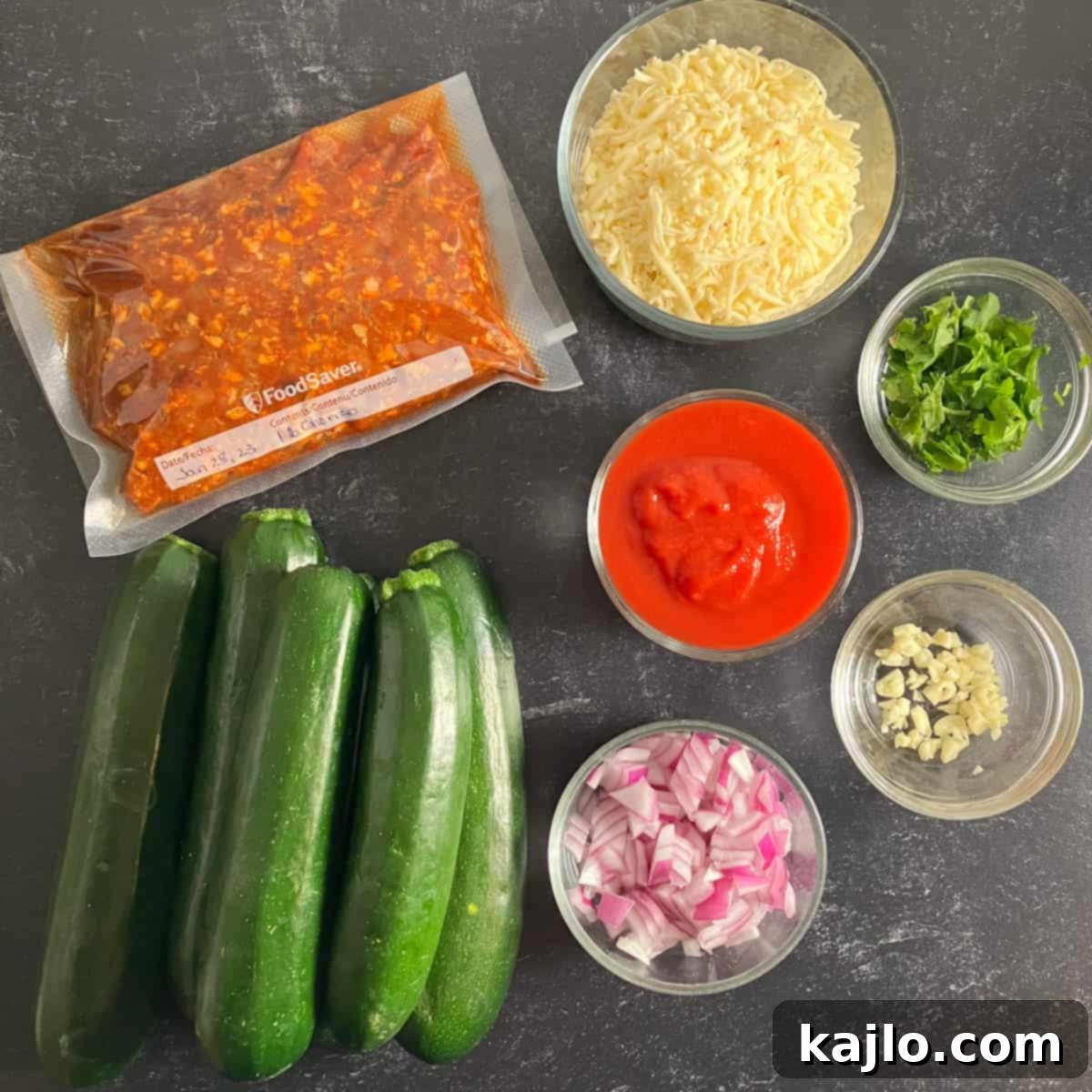 Fresh ingredients for making chorizo stuffed zucchini boats