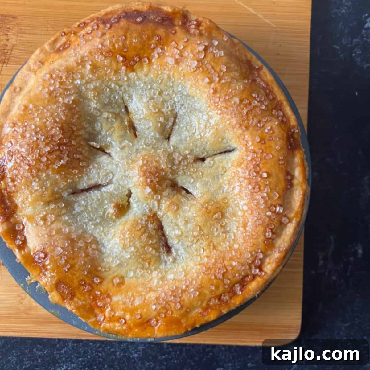 Air Fryer Mini Cherry Pies 5 A freshly air fried cherry pie, perfectly golden and ready for serving.