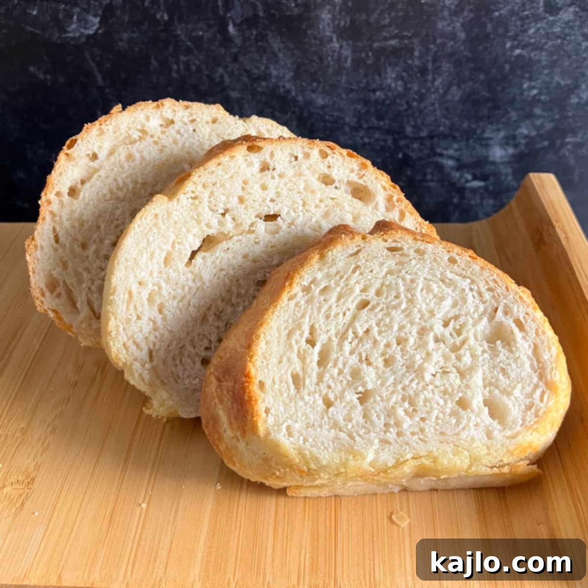 Air Fryer Bread Made Easy 7 A freshly baked loaf of air fryer bread cooling on a rack.