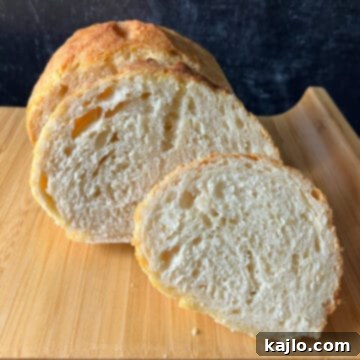 Air Fryer Bread Made Easy 9 A golden-brown loaf of air fryer bread.