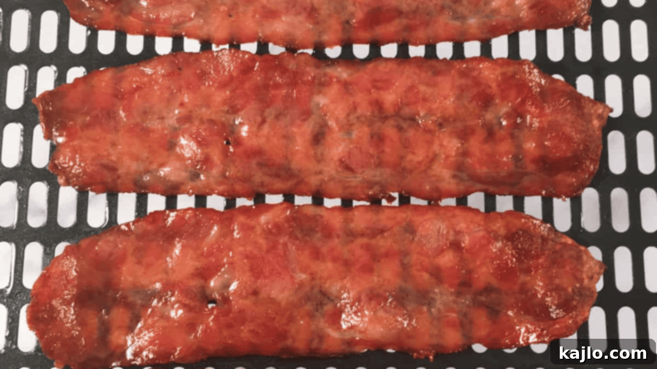 Crispy and lean: Air fryer turkey bacon, a healthy and quick breakfast side.