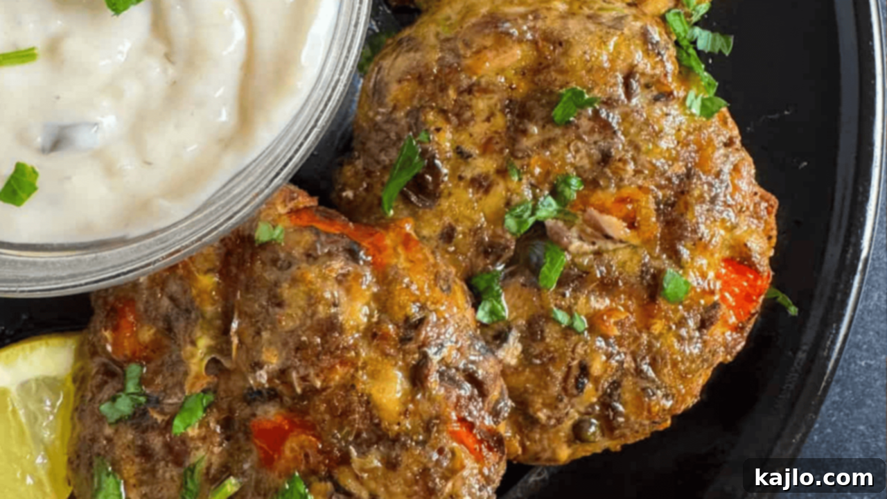 Nutrient-rich and crispy sardine cakes made in an air fryer, served with a garnish