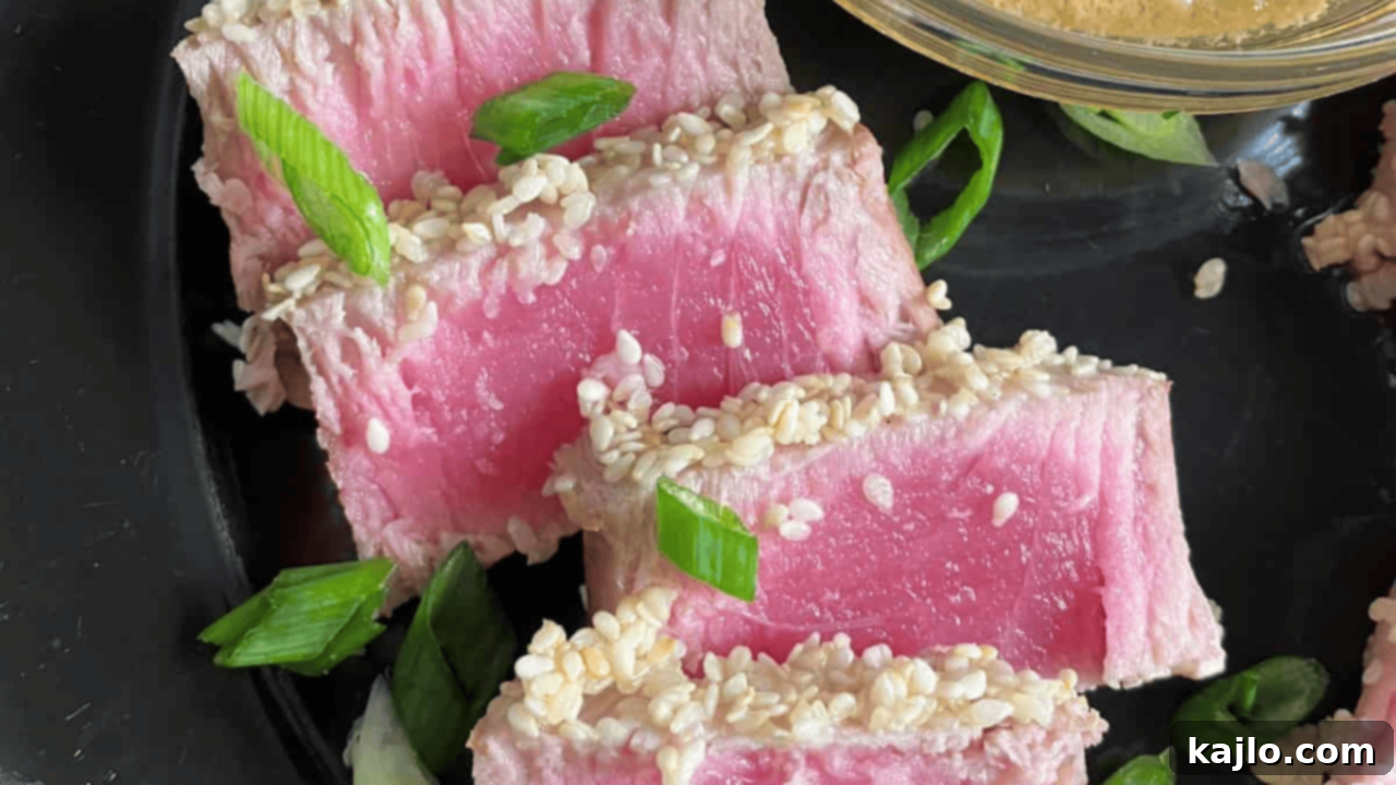 Perfectly seared air fryer tuna steak with a pink center, ready to be served