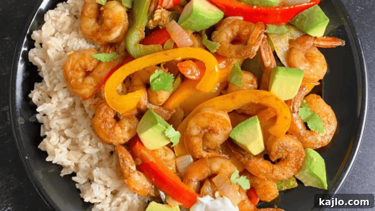 My 70-Pound Transformation: What Really Worked 11 A vibrant shrimp fajita bowl, perfect for weight loss meal prep, featuring seasoned shrimp, colorful peppers, onions, and cauliflower rice.