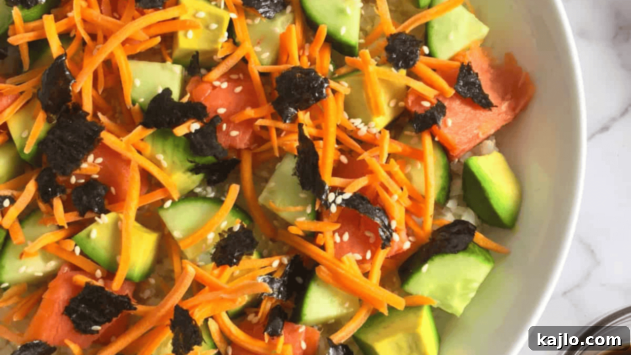 My 70-Pound Transformation: What Really Worked 6 Deconstructed smoked salmon sushi bowl with avocado, cucumber, and cauliflower rice, perfect for a keto and low-carb meal.