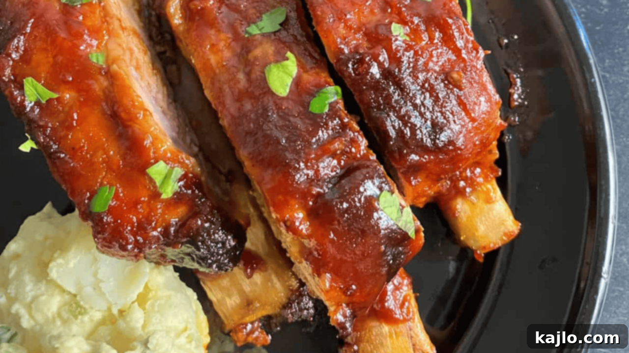 10 Recipes You'll Keep Coming Back For 2 Smoky, fall-off-the-bone St. Louis Ribs, slow-cooked to perfection and basted with a tangy barbecue sauce, served as a decadent dinner.